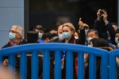 les experts de l'OMS visitent le marché de Wuhan, là où tout a commencé.jpg les experts de l'OMS visitent le marché de Wuhan, là où tout a commencé.jpg