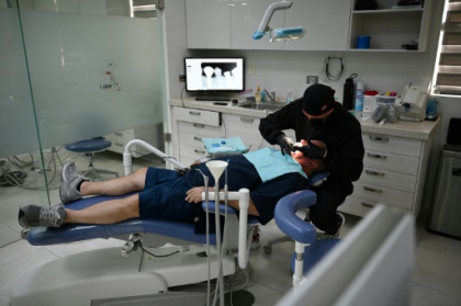 Americans seek cheaper dentistry in Mexico's.jpg