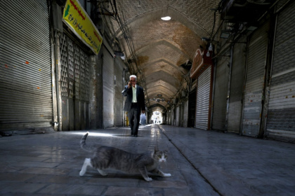 Le Grand Bazar de Téhéran fermé en raison des attaques israéliennes, le 16 juin 2025 - ATTA KENARE (AFP) Le Grand Bazar de Téhéran fermé en raison des attaques israéliennes, le 16 juin 2025 - ATTA KENARE (AFP)