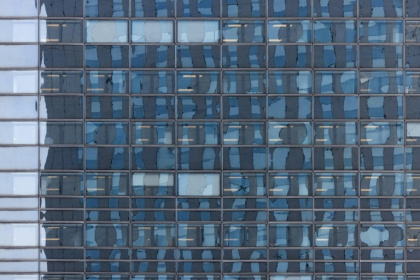 La façade vitrée d'un immeuble du quartier d'affaires de la Défense à Courbevoie, à l'ouest de Paris, le 25 mars 2025 - JOEL SAGET (AFP) La façade vitrée d'un immeuble du quartier d'affaires de la Défense à Courbevoie, à l'ouest de Paris, le 25 mars 2025 - JOEL SAGET (AFP)